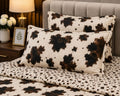 Close-up of brown leaf print comforter set showing pillow shams detail