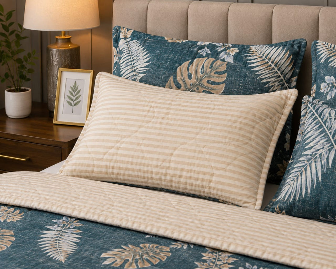 Teal tropical leaf 4-piece comforter set on a styled bed with product details